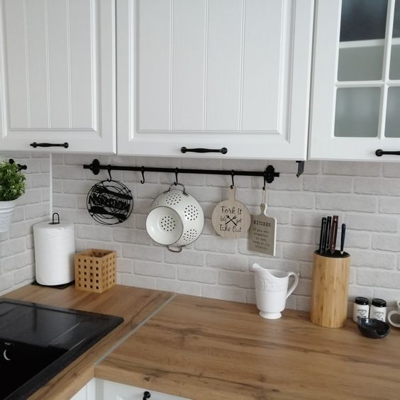 Фото № 3: 20 способов хранения сковородок на кухне